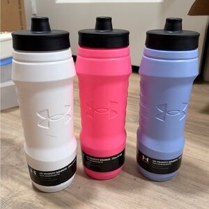 Under Armour White, Pink, and Blue Water Bottles